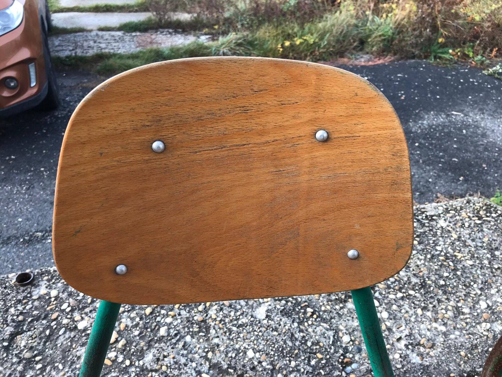 Set of 3 children's chairs from the 1960s in brown plywood with a green steel frame, school style.