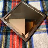 Art Deco mirror in chiseled wrought iron with beveled glass