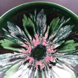 Green faience bowl decorated with multicolored drips around 1970