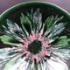Green faience bowl decorated with multicolored drips around 1970