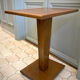 Square pedestal table with central foot 1930