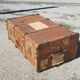 Old travel trunk made of wood and brass