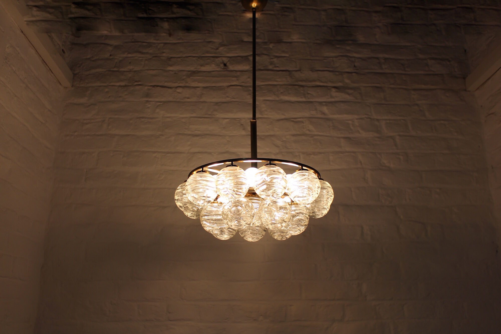 Brass chandelier and glass globes