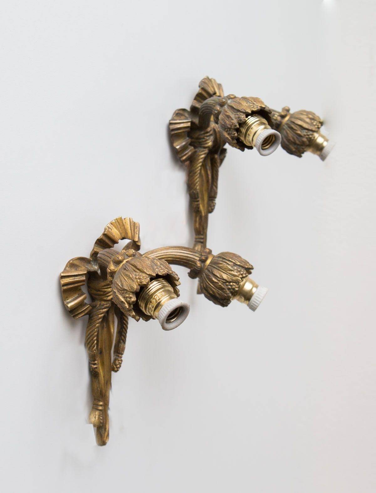 Pair of old French bronze wall lights from the beginning of the 20th century.