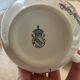 Two luneville cups with saucer