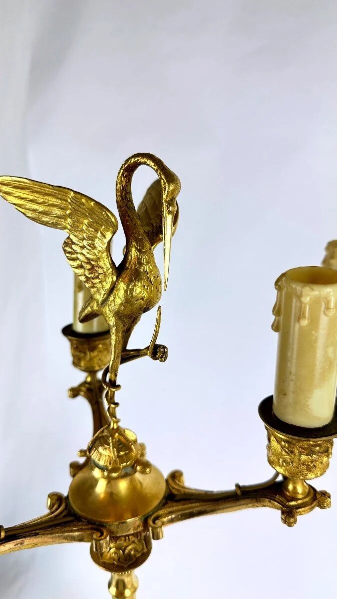 Pair of candelabra with a crane in gilded bronze, bamboo model.