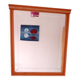 Beveled glass wall mirror in solid wood frame