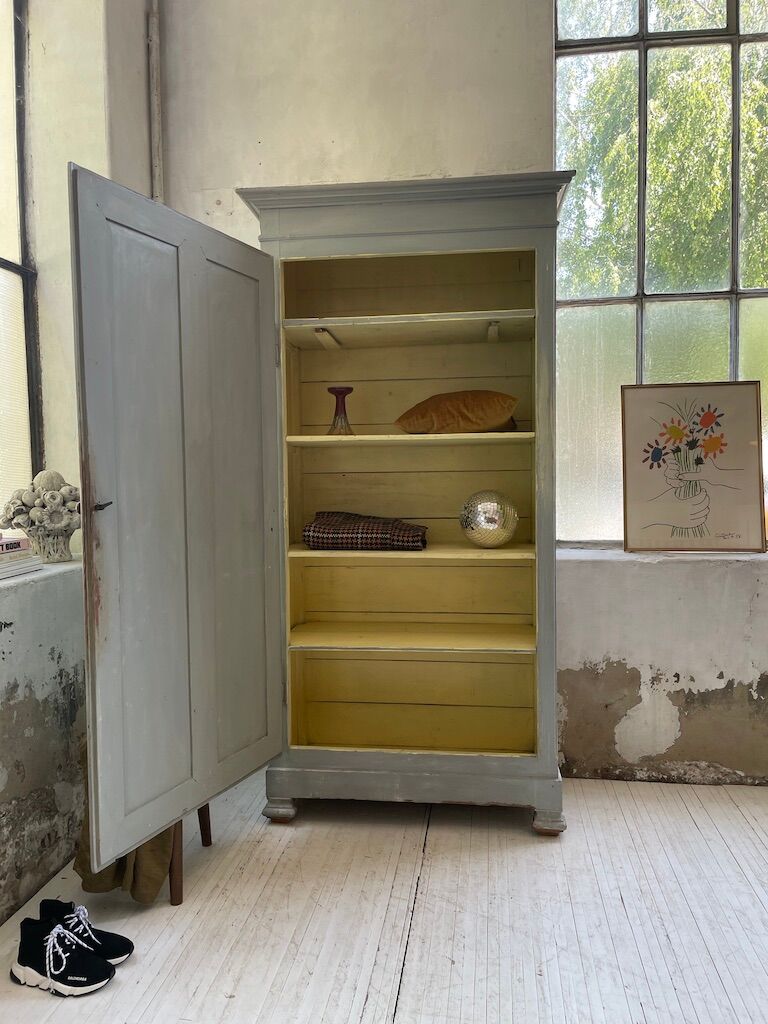 Blue patinated cap cabinet