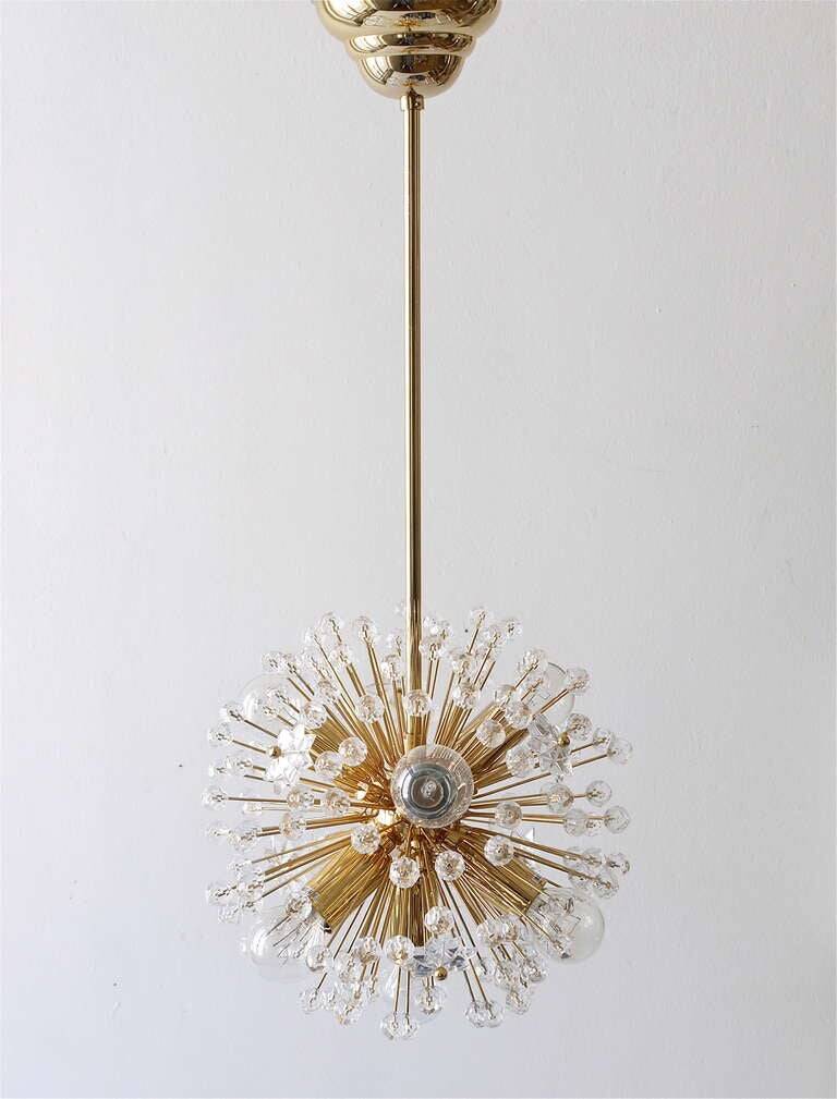 Two golden Sputnik ball chandeliers by Emil Stejnar, Austria, 1970s.