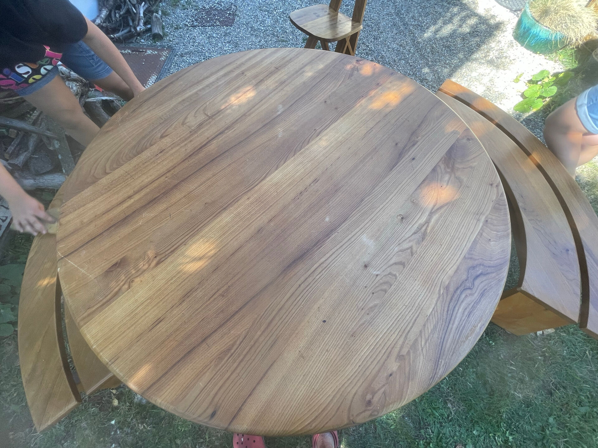 Round table + 2 chairs and 2 rounded benches suitable for the table.