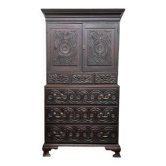 Antique tall wardrobe in dark carved wood / bohemian wardrobe
