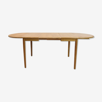 Oak table with fellers and an extension of the 60