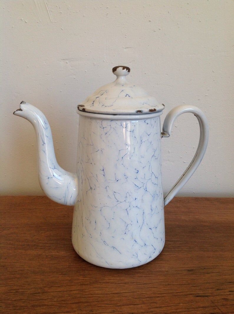 Enamelled tin teapot