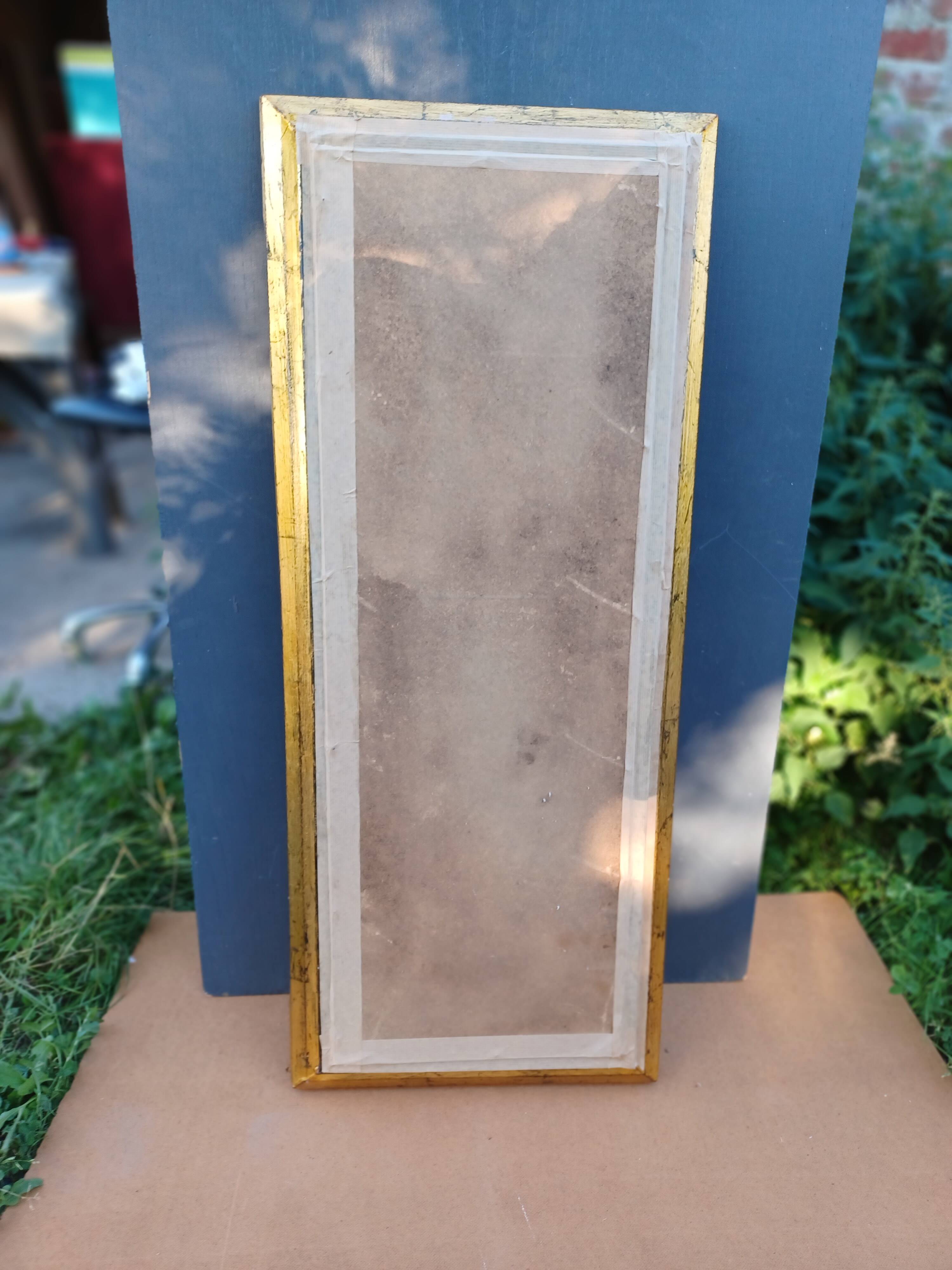 NARROW GOLDEN MIRROR IN LOUIS XV STYLE