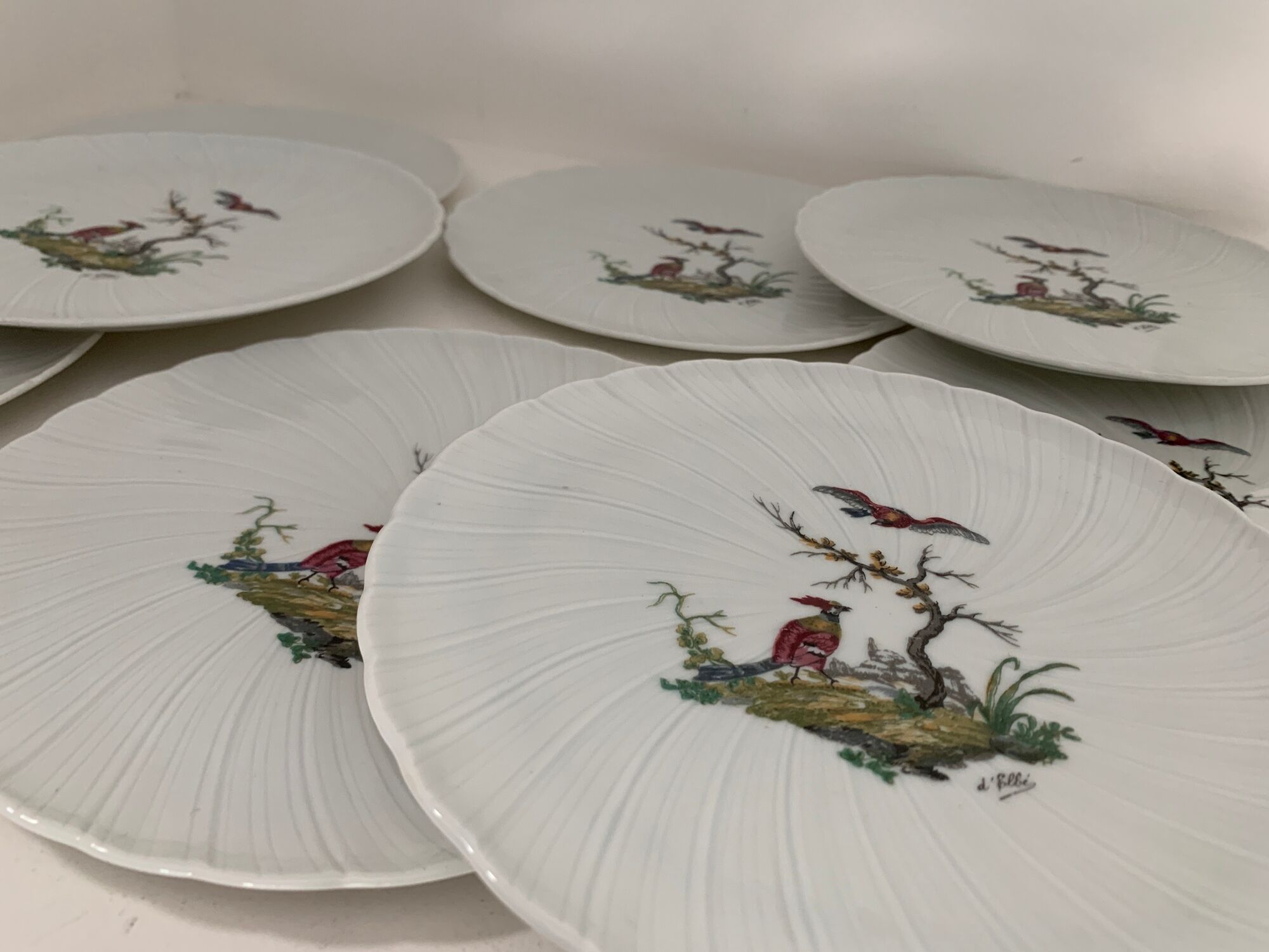 8 Bernardaud and Co. dessert plates signed Elbé, Limoges porcelain, decorated with birds