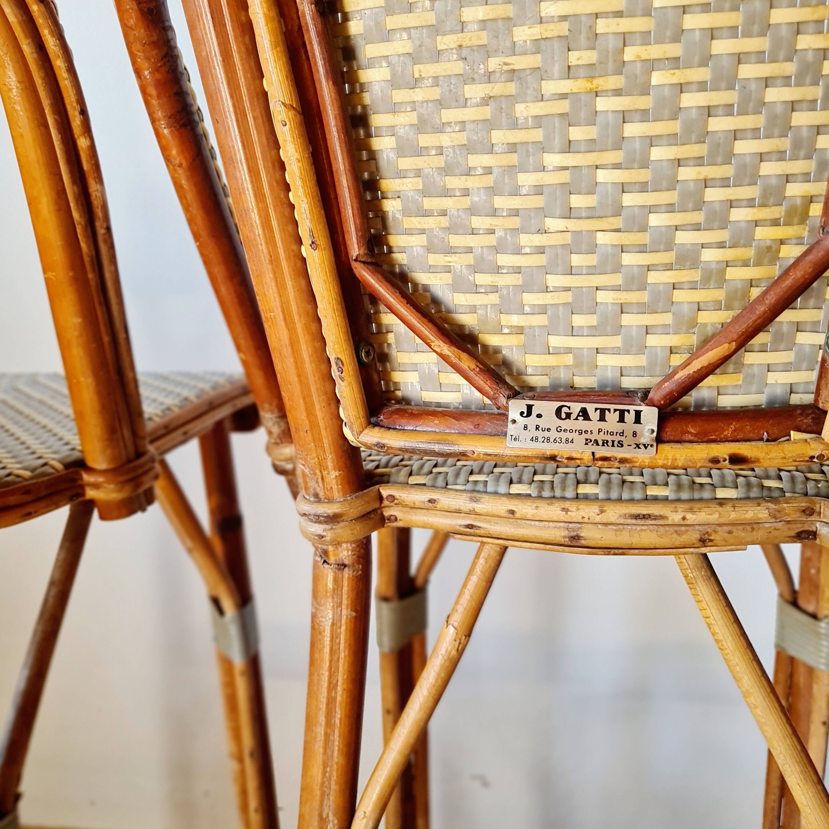 Vintage Gaty bar stools in two-tone rattan and caning.