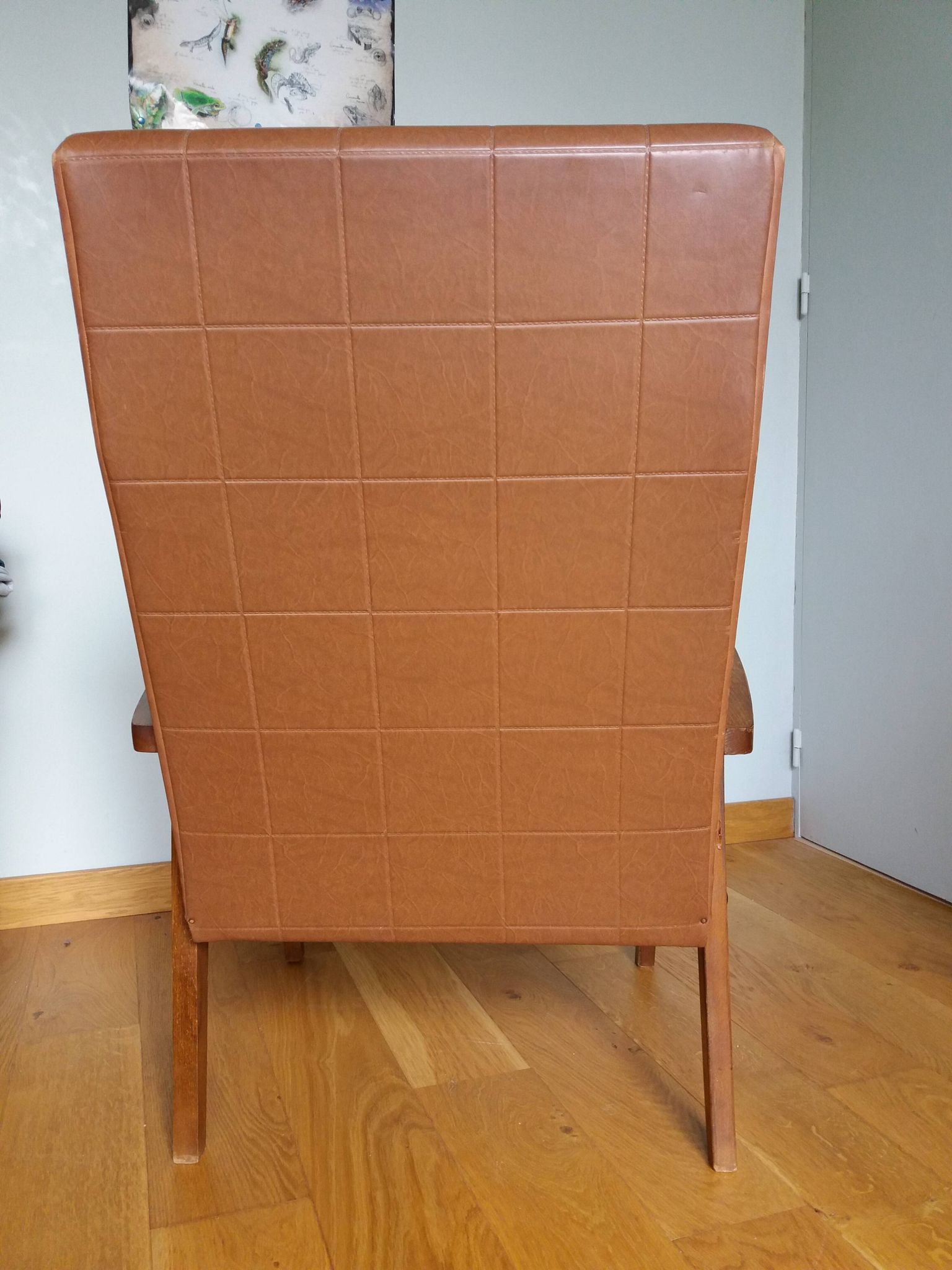 Scandinavian brown skai and wood armchair