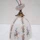 Old wall lamp 45° and its tulip lampshade decorated with flowers