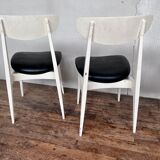 Series of 4 white and black Scandinavian chairs Ingrid from Stella 1960.