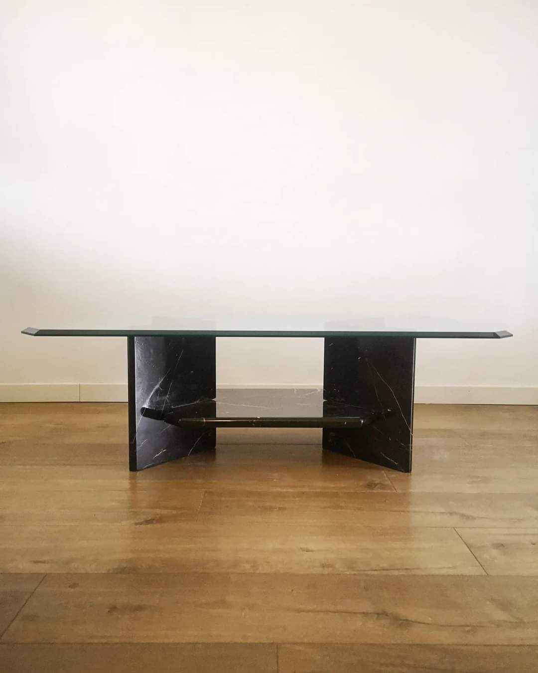 Glass coffee table and black marble base