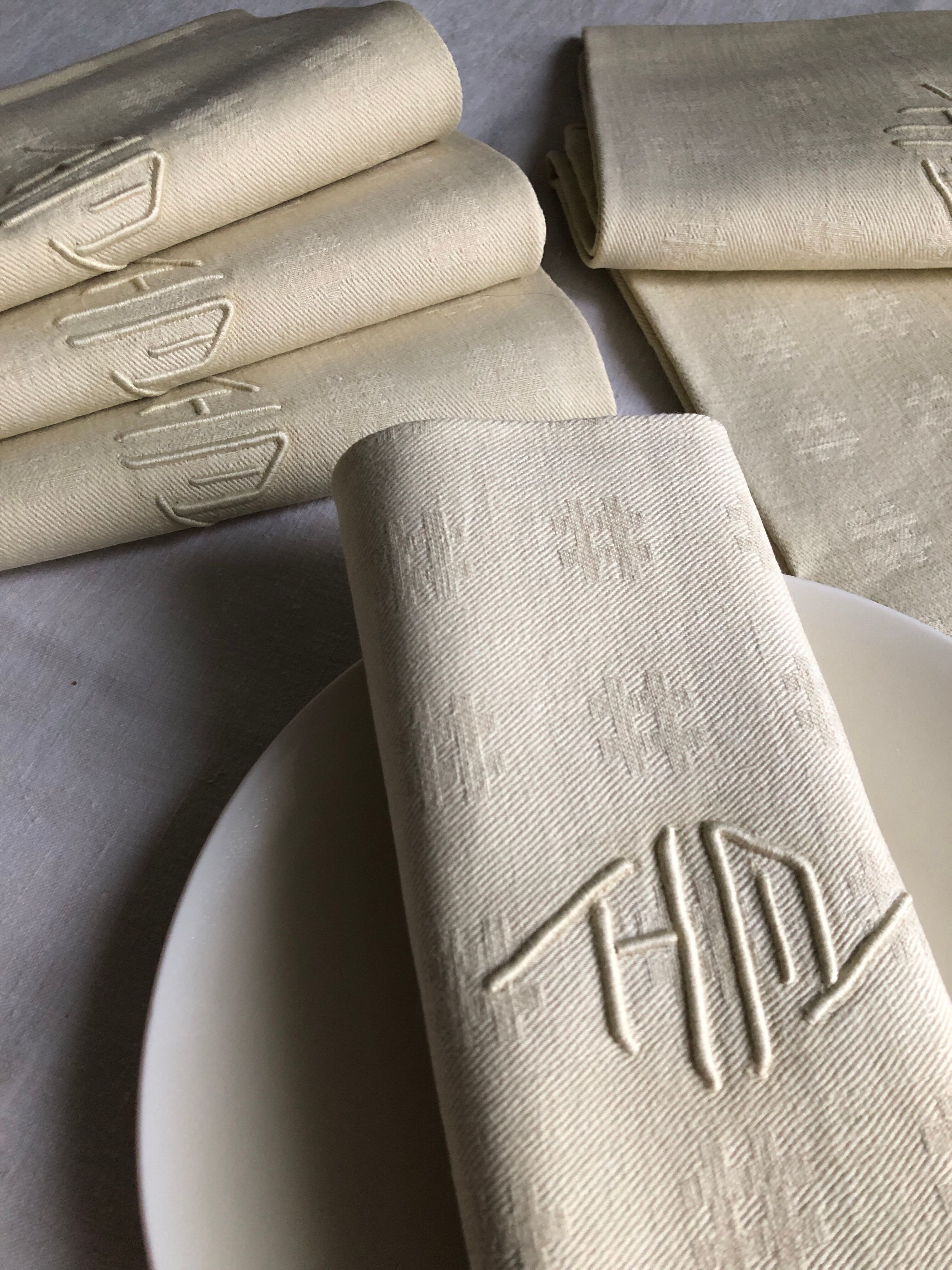 Antique napkins damascus and monogrammed tinted fresh butter