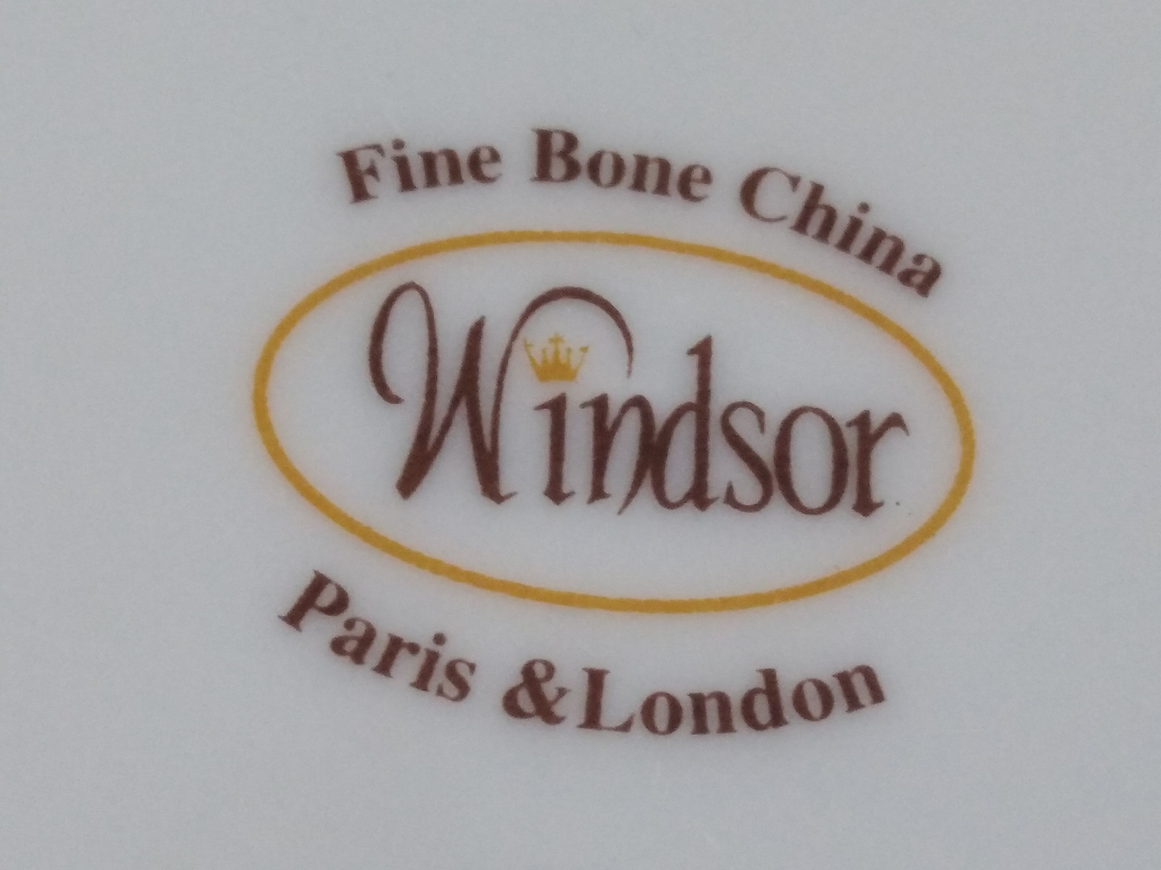 Large April tea cup and Windsor English porcelain saucer