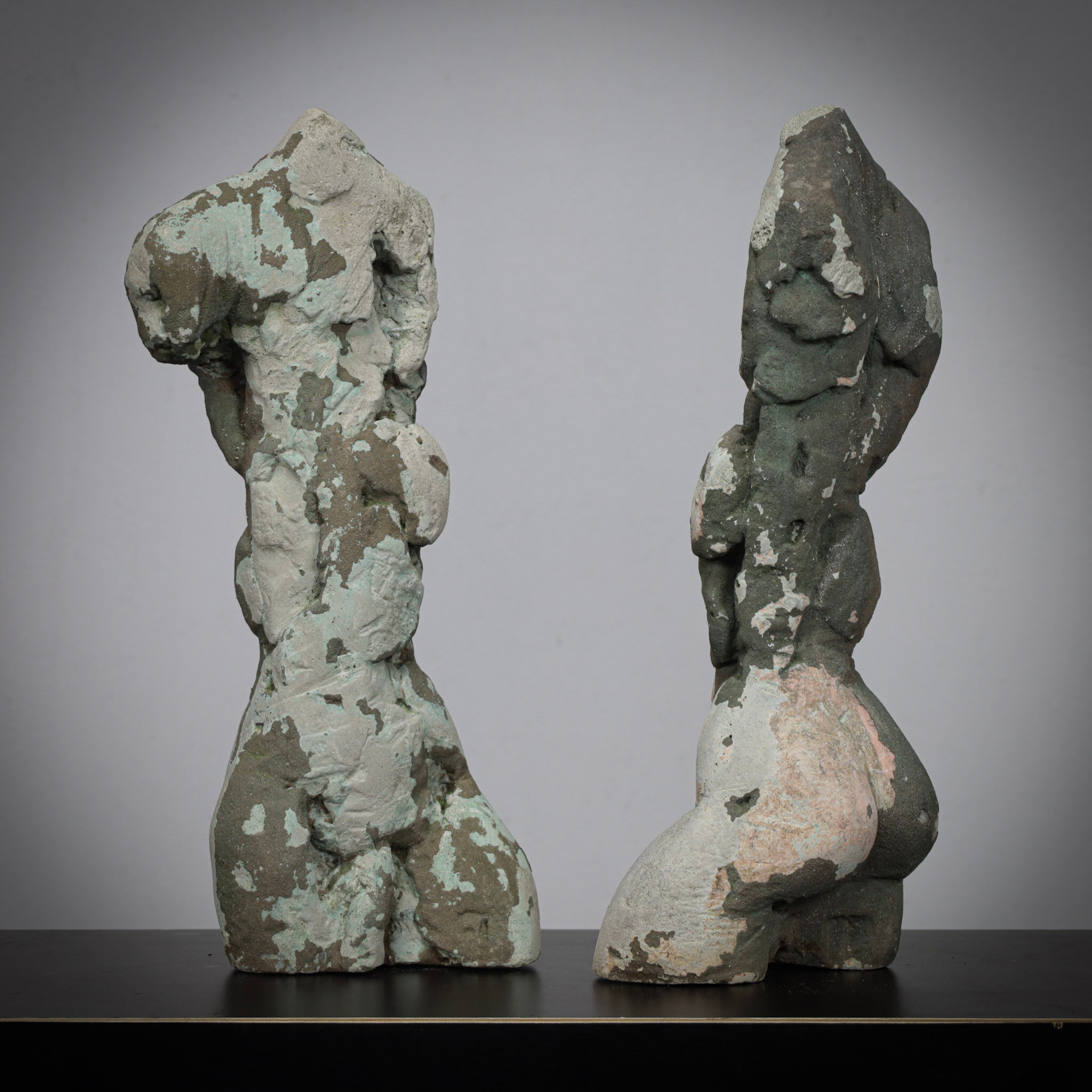 Pair of male torso sculptures by Francine Govers, 1990s