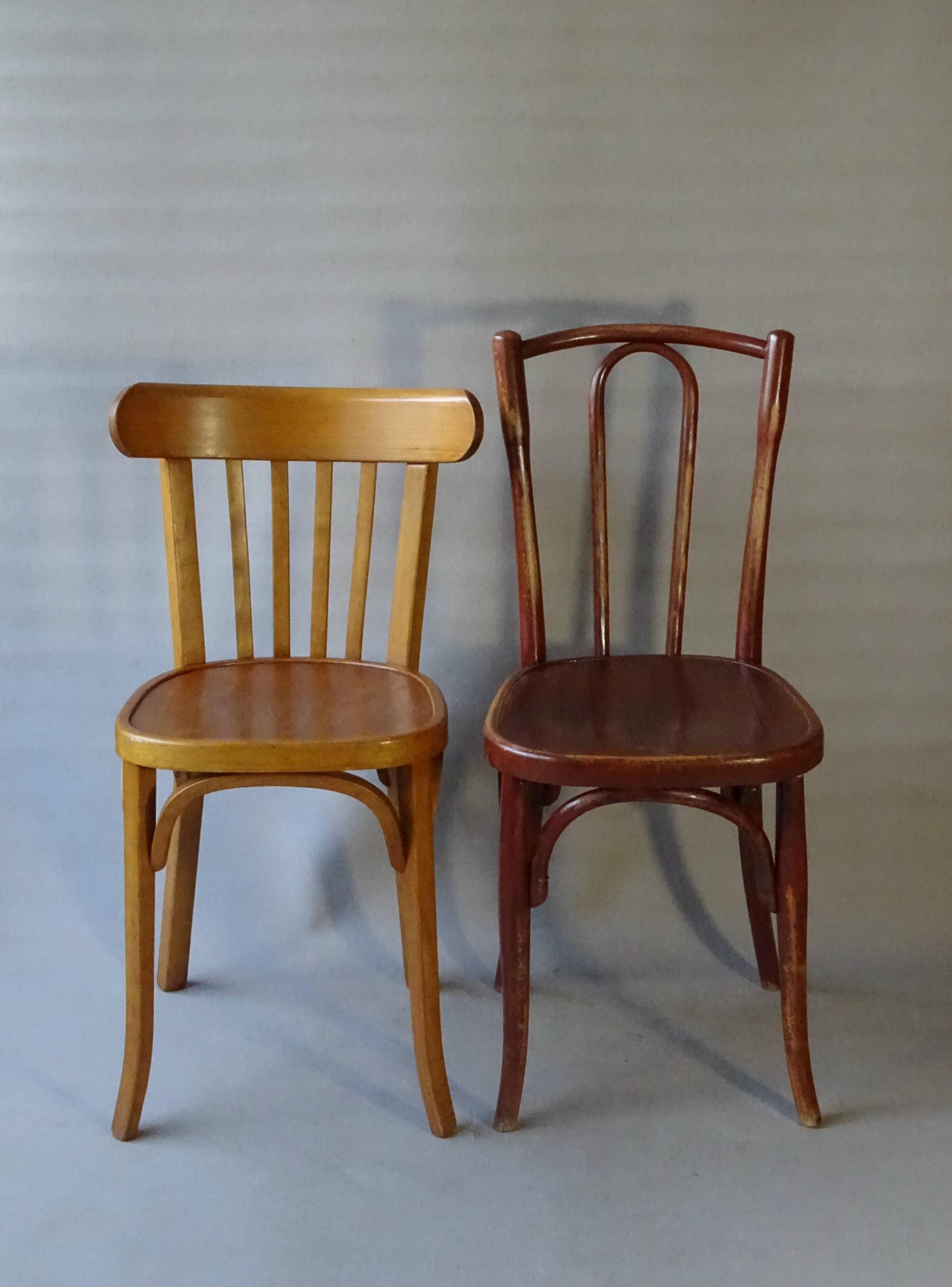 Set of 36 mismatched Bistrot chairs, 1920 to 1950, wooden seats.