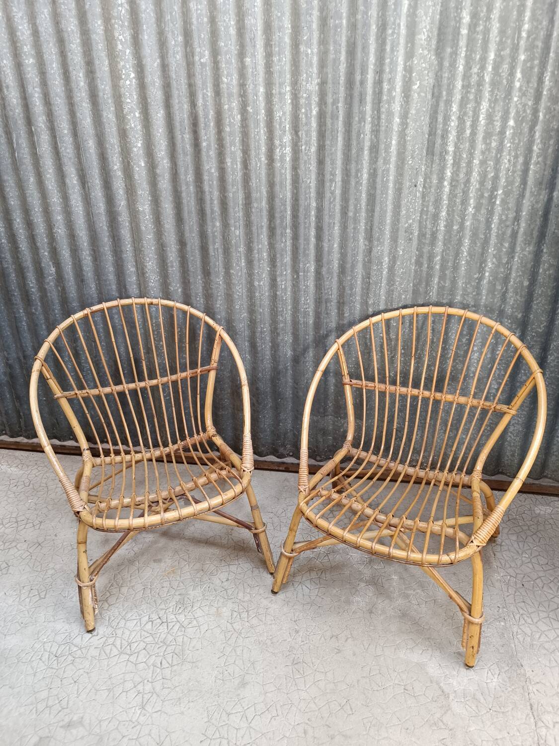 Vintage rattan wicker garden furniture set with 2 shell armchairs and a bar table