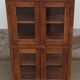 Old wooden display cabinet with three glazed sides