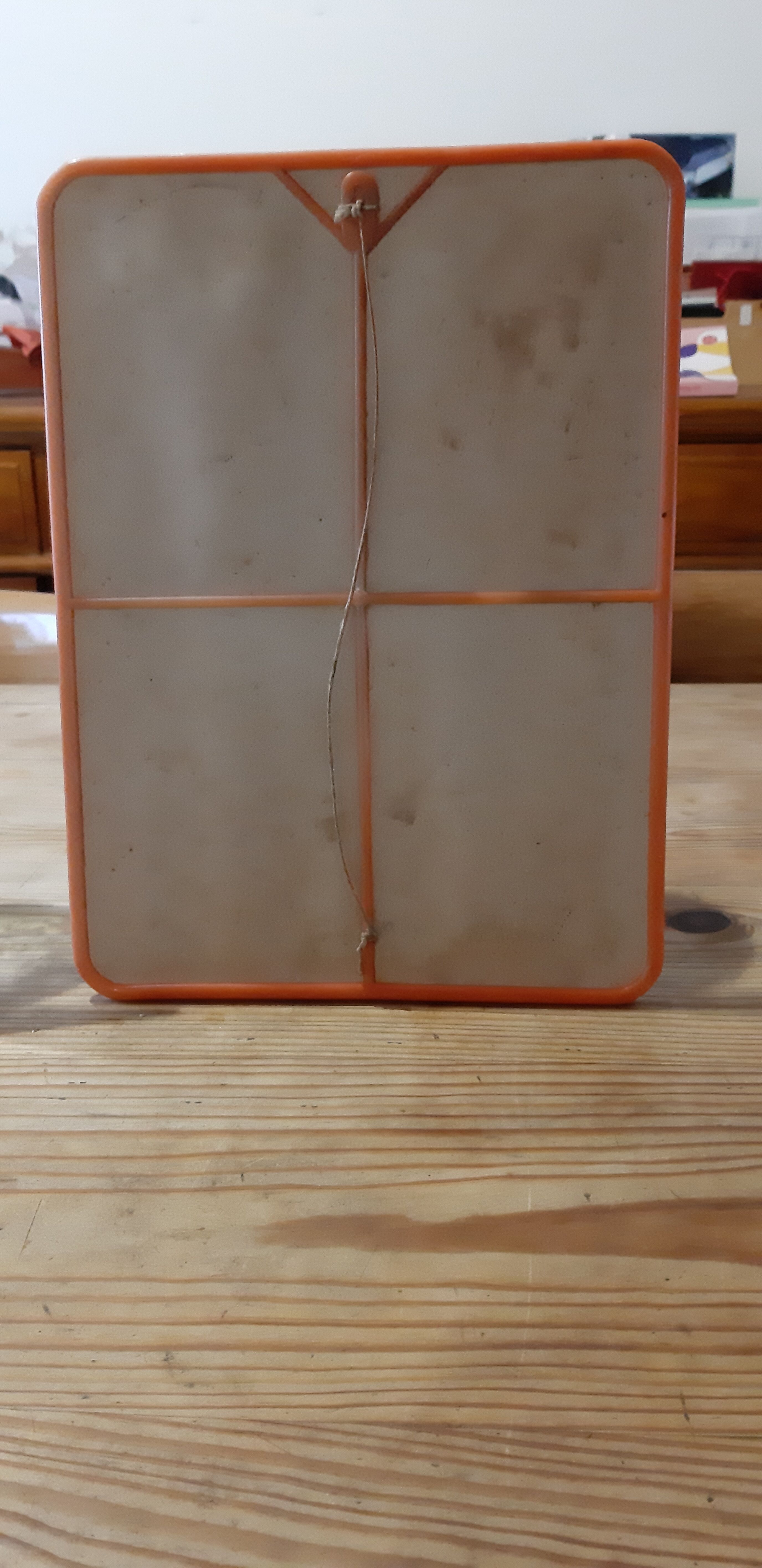 2 vintage plastic orange mirrors