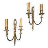 Pair of Louis XVI style bronze wall sconces with bow and tassel, 1940s.