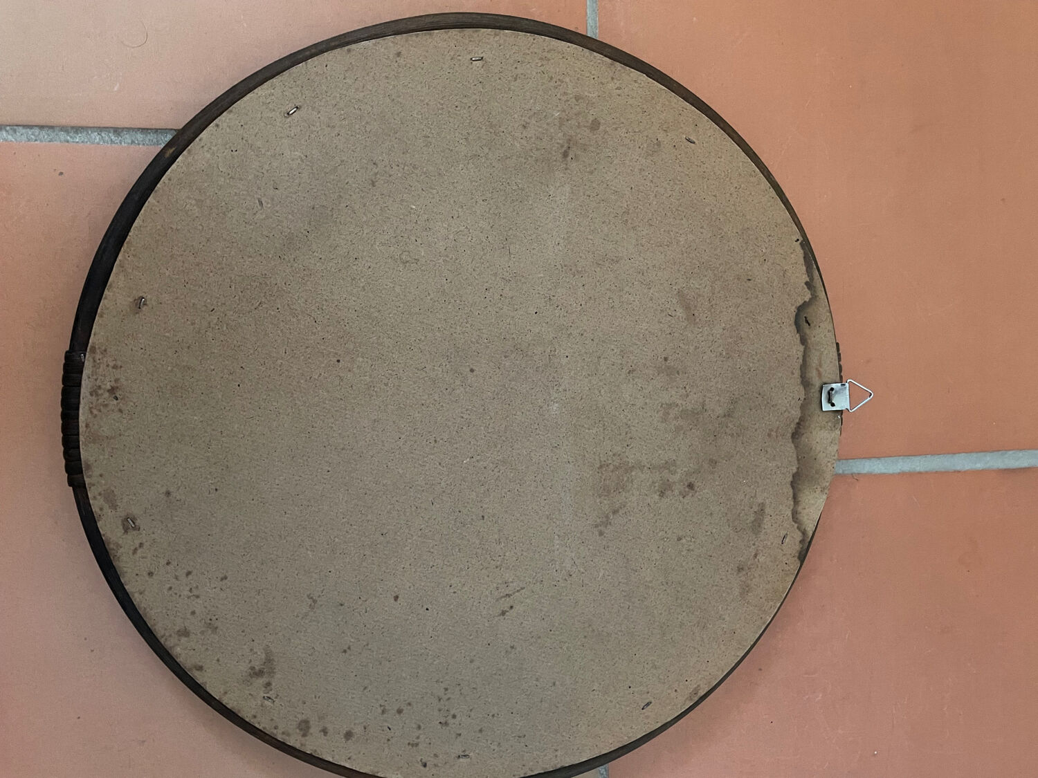 Round rattan mirror