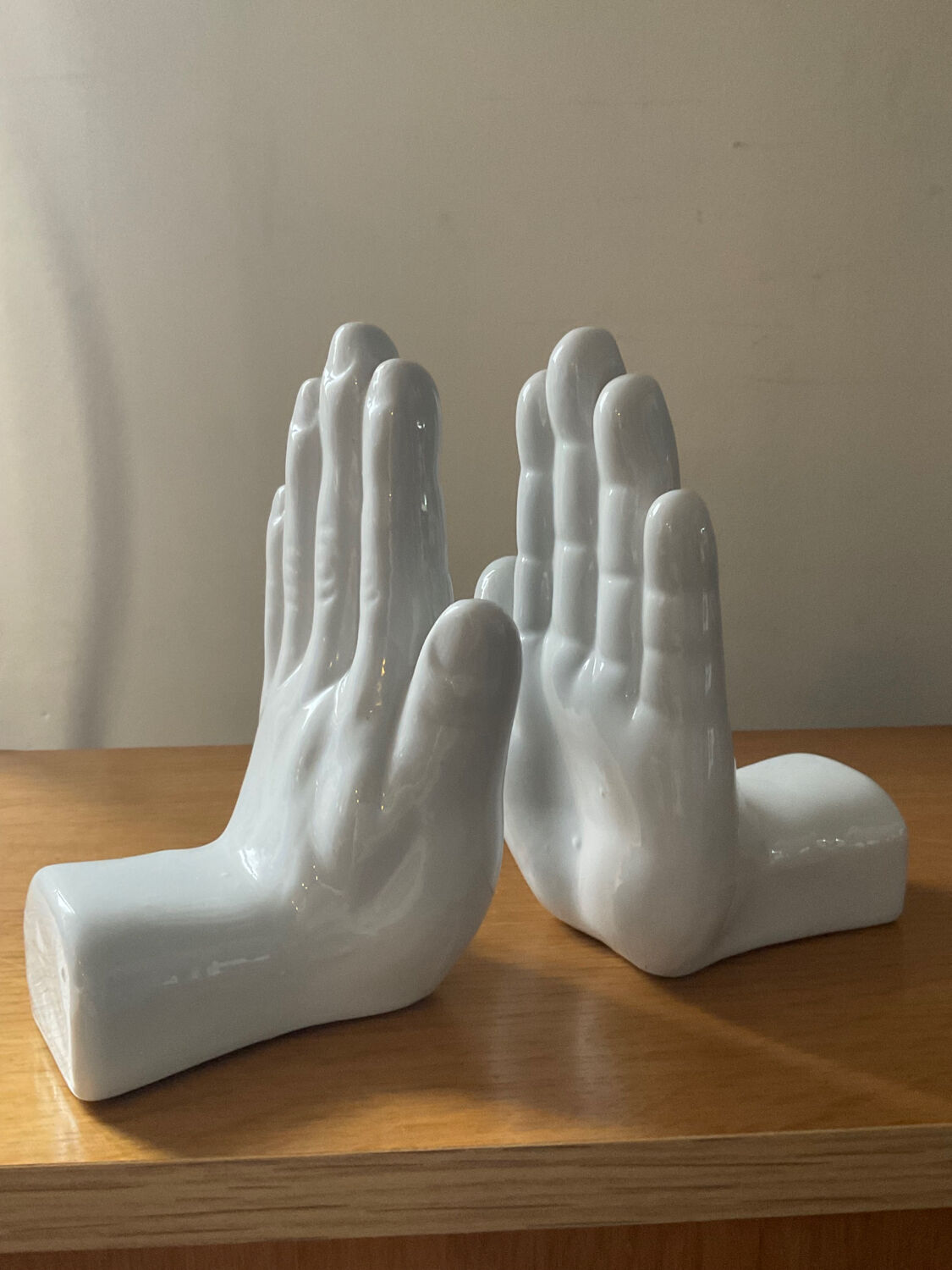 Pair of ceramic hand bookends in the 70s