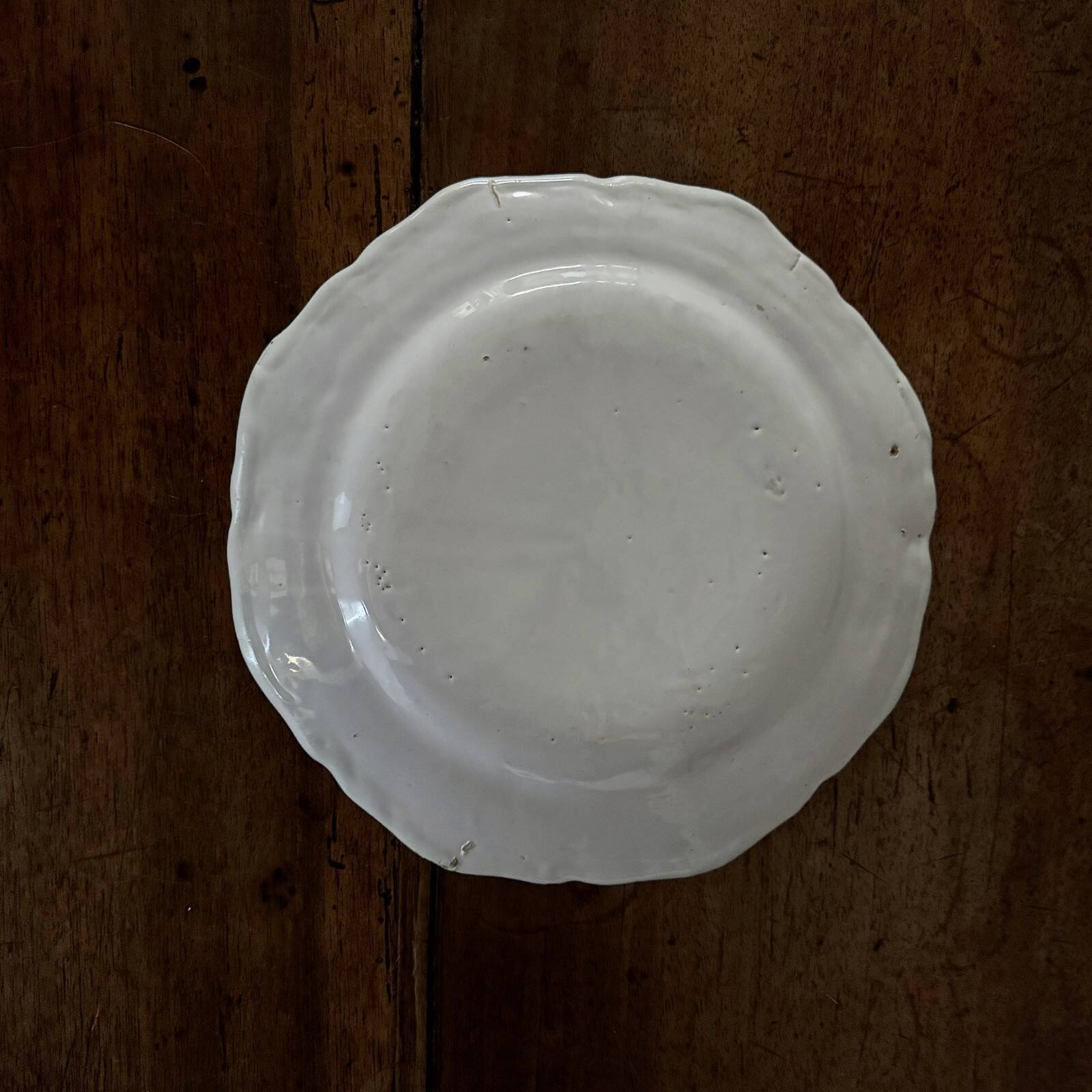 18th-century Moustiers earthenware plate with floral decoration