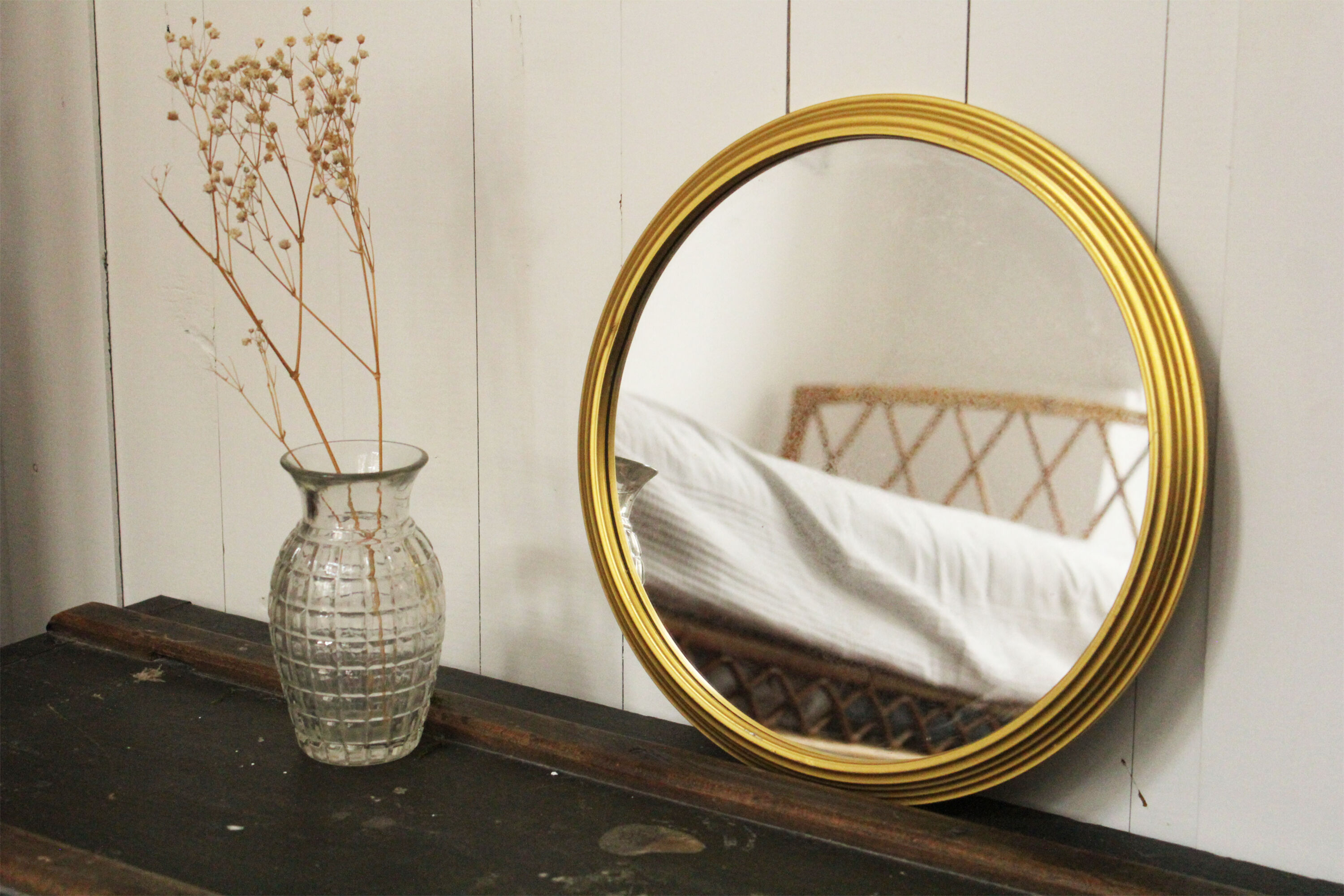 Miroir vintage rond  bordure acier doré