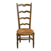 Chaise de nourrice ancienne en bois et paille – dossier ajouré à barreaux c