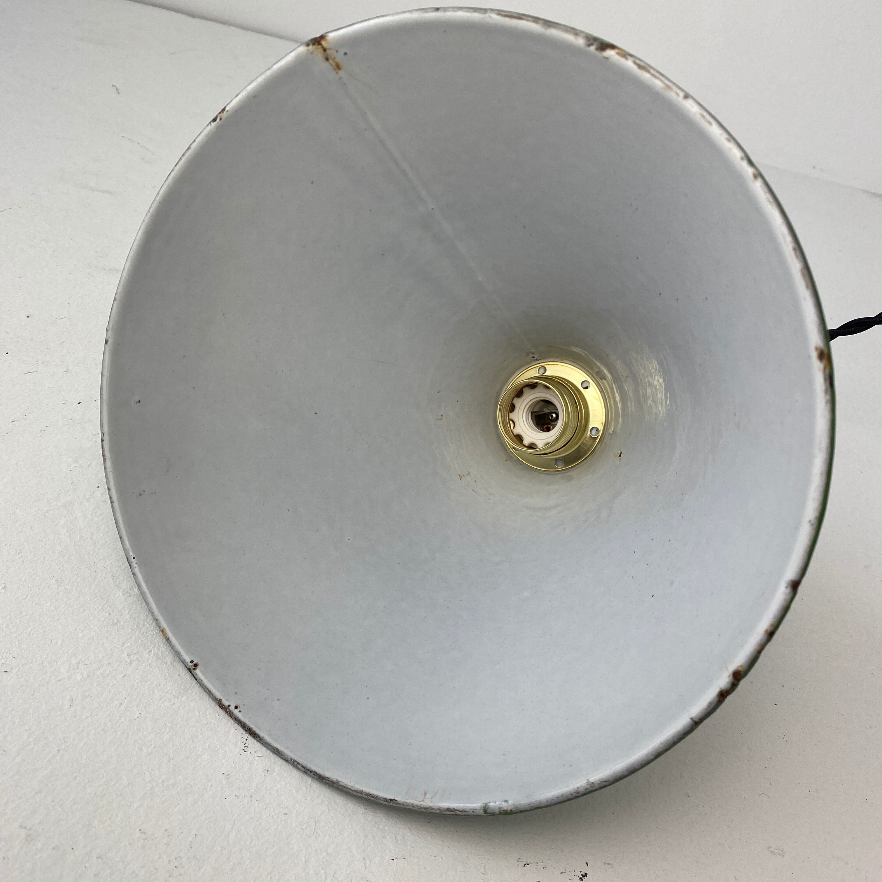 Old green enamelled conical industrial hanging lamp