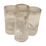 Four glasses with liqueur