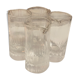 Four glasses with liqueur