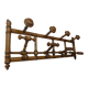 Wall-mounted coat rack made of turned wood