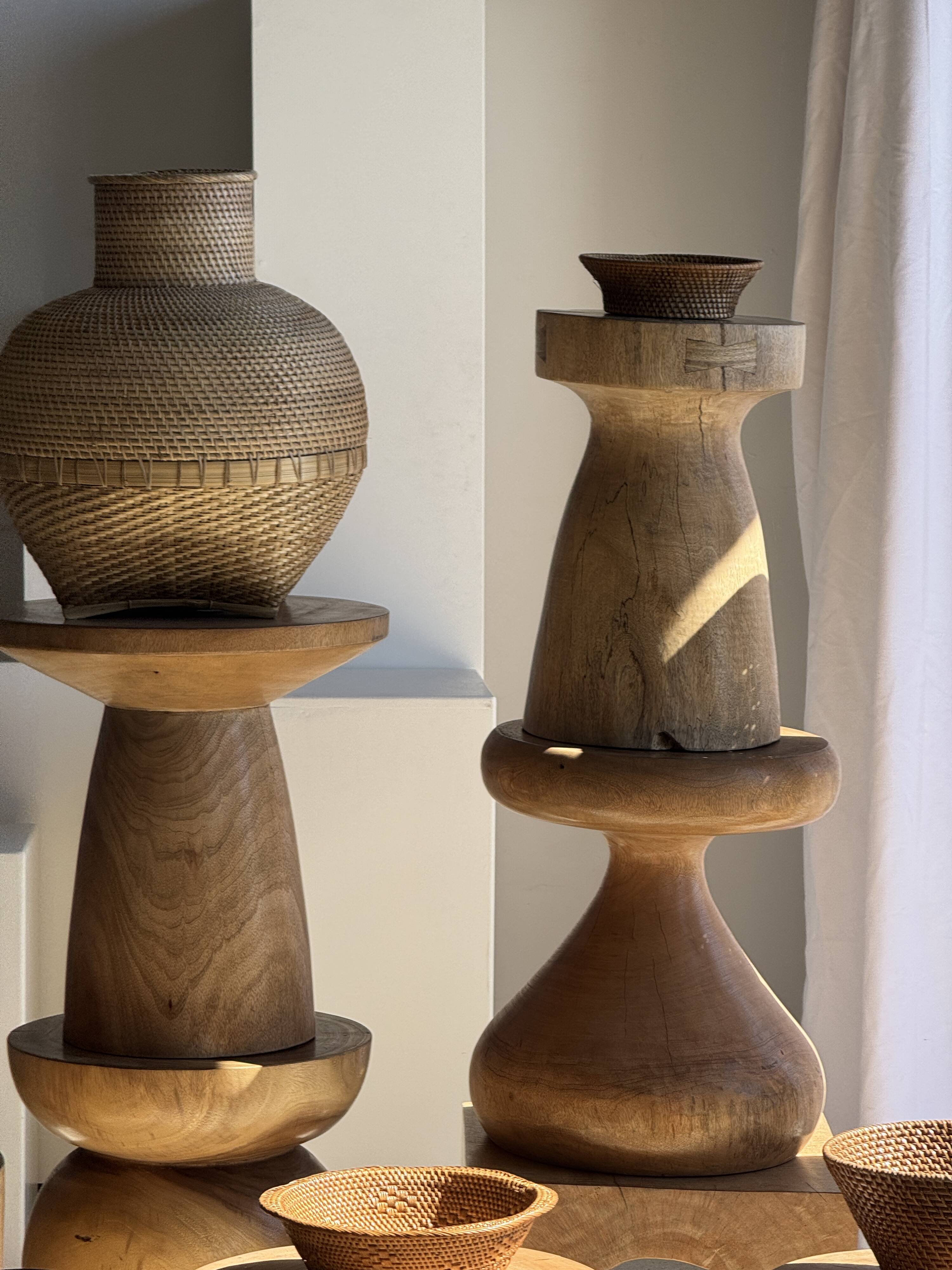 Natural solid mango side table (monoxyle) with conical legs.