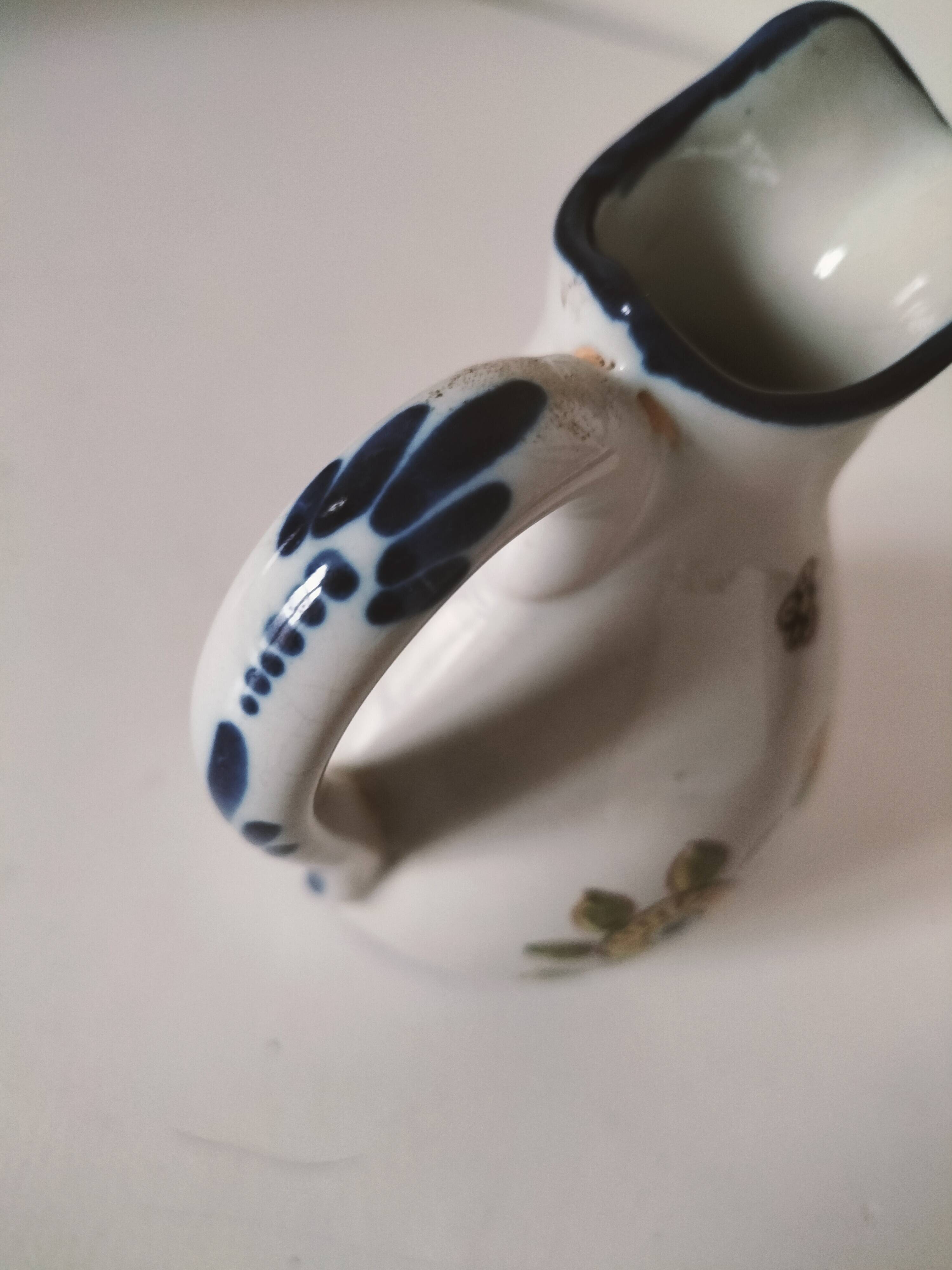 Small Malicorne pitcher with hand-painted floral decoration