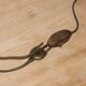 Vintage lamp base in patinated gold metal – foliage decor – 25 cm