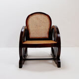 Art Deco armchairs in wood, with cane seat and backrest, circa 1930.