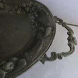 Large pewter cup with handles and patterns