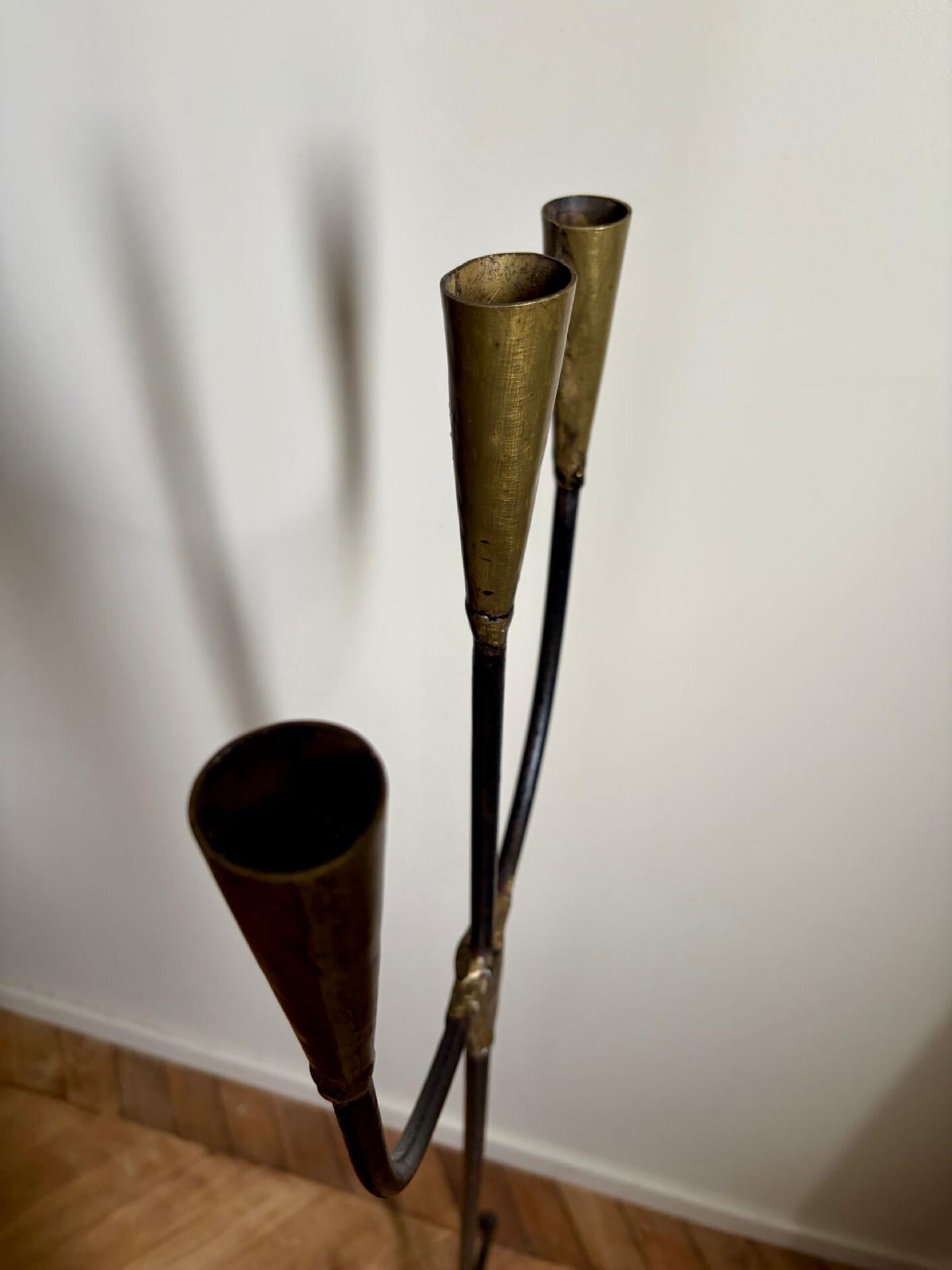 Candelabrum for the floor in wrought iron and brass.