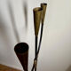 Candelabrum for the floor in wrought iron and brass.