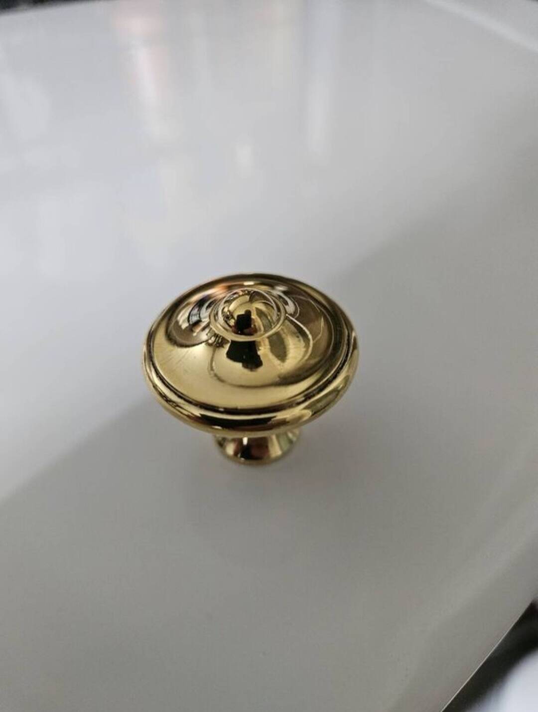 6 polished brass furniture knobs