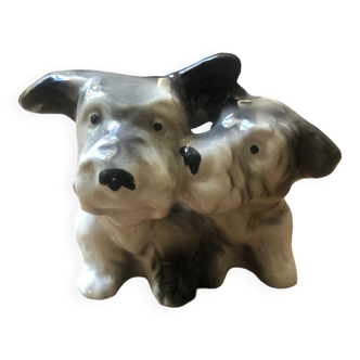 Old porcelain dog statuette